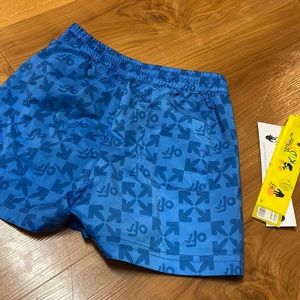 Off white boy’s swim trunks